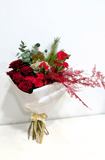 Winter bouquet with red rose