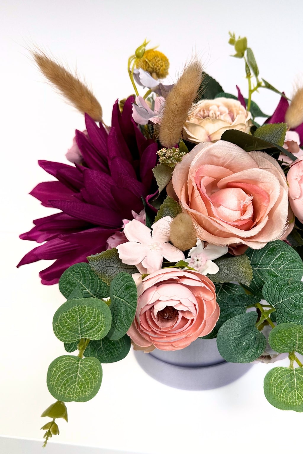 Flowers in a lilac box