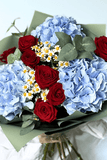 Hydrangea and red roses